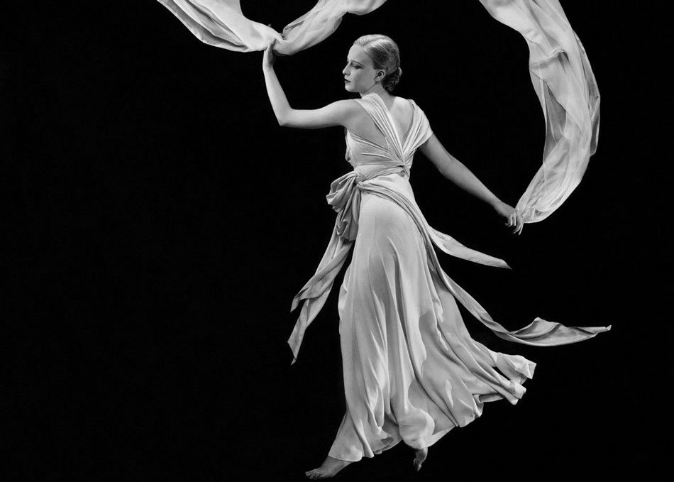 Model wearing Madeleine Vionnet bias-cut gown in flowing Grecian drape, photographed by George Hoyningen-Huene, 1930