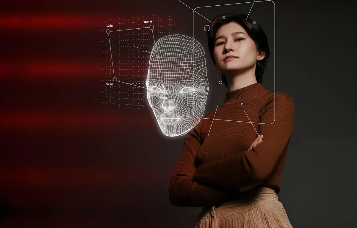 Young woman with digital interface, symbolizing the integration of STEM skills in fashion design, highlighting the industry's shift towards technology and innovation.