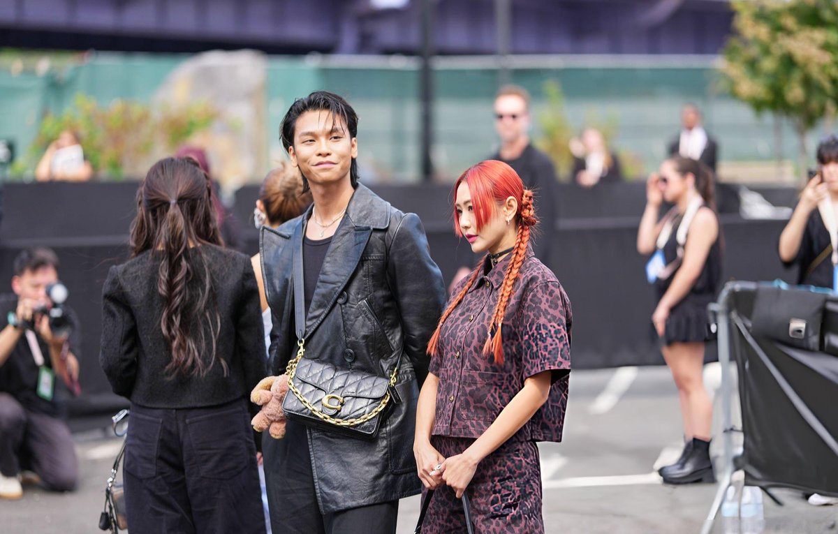 Fashion-forward guests outside Coach show during September 2025 New York Fashion Week demonstrating diverse street style that defines the city's influence as global fashion capital