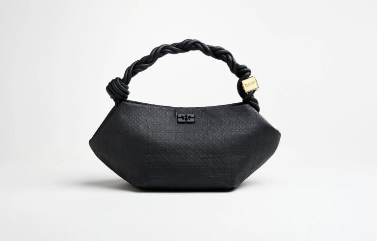 GANNI Bou Bag prototype made from lab-grown bacterial cellulose, featuring embossed geometric pattern and knotted black handle with gold GANNI charm