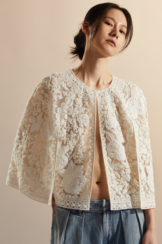 Wei i Hsieh Breaking Free embroidery detail, dense layered floral stitching forming traces of emotion across the garment surface