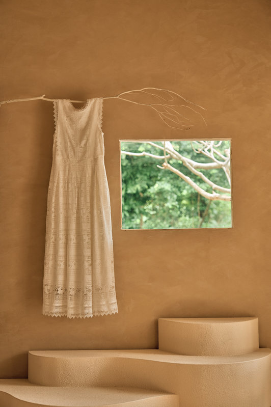 Wei i Hsieh Breaking Free fabric detail, dress suspended on a branch revealing the interplay of lightweight and structured materials in tension and release