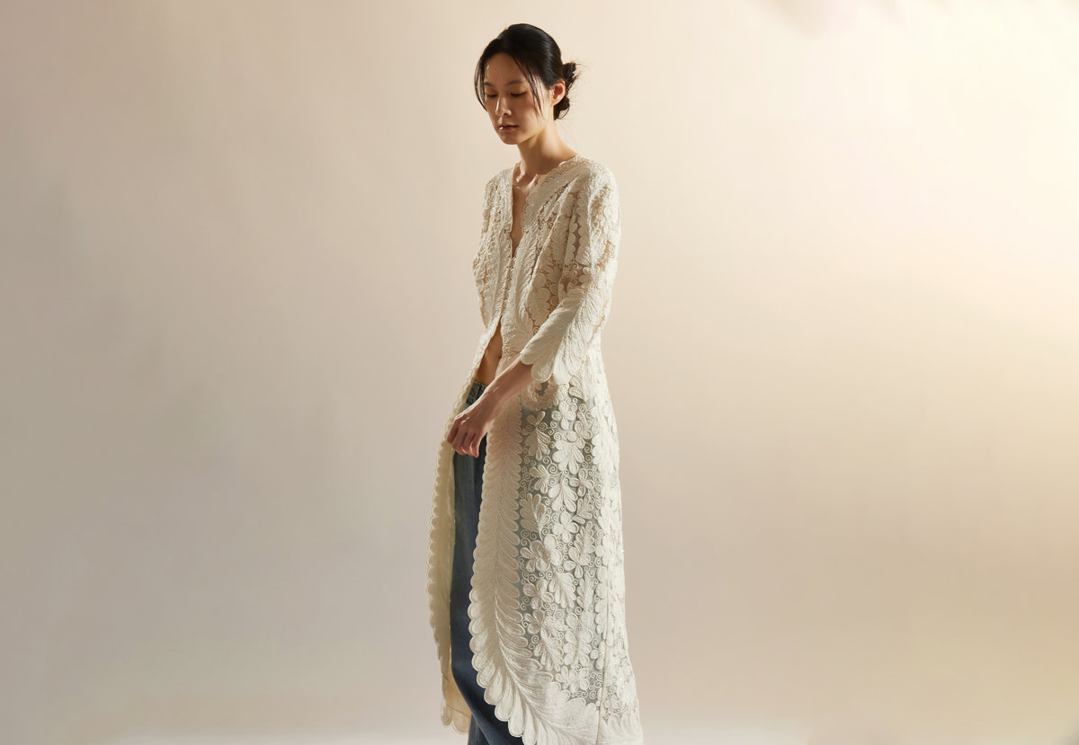 Wei Hsieh Breaking Free lace structural network, delicate layered lace forming soft internal scaffolding within the garment