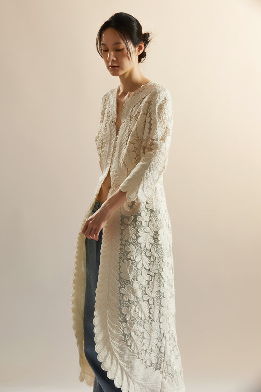 Wei i Hsieh Breaking Free lace structural network, delicate layered lace forming soft internal scaffolding within the garment