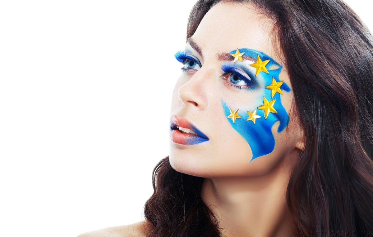 Model with European Union flag face paint, symbolising EU cosmetics regulation